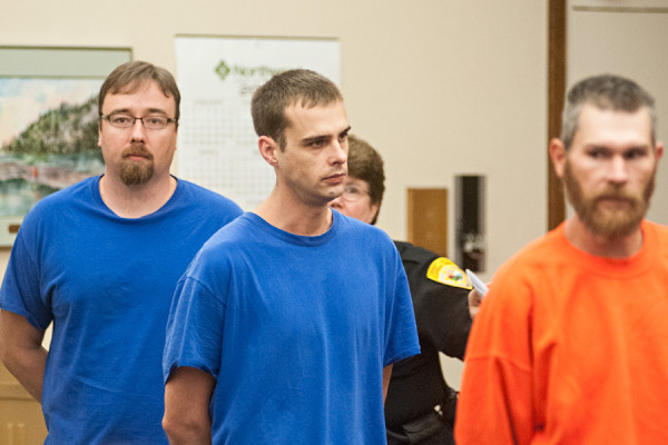 An online sting involving law enforcement agents posing as an adult woman offering a 12-year-old girl for sex nabbed at least six local men, who now face felony charges after their arrests. Three of the men, Christopher Paul Adams, Justin Allen Zeiss and Joshua Frederick Naethe, appear for their arraignment at Flathead County District Court on Sept. 4, 2014. Greg Lindstrom | Flathead Beacon