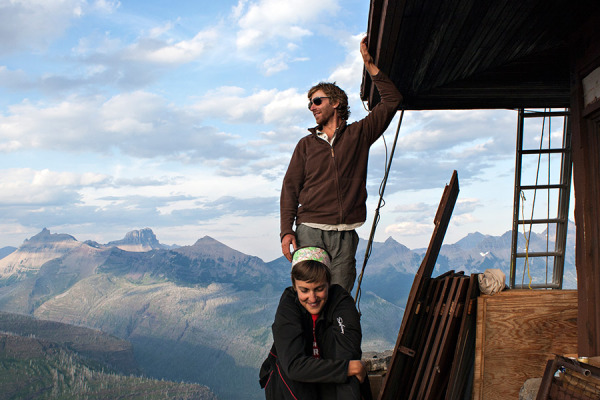Mike Roesch and Stephanie Pieper relax after assisting with stabilization efforts at Heaven's Peak Lookout. Photo by Tristan Scott