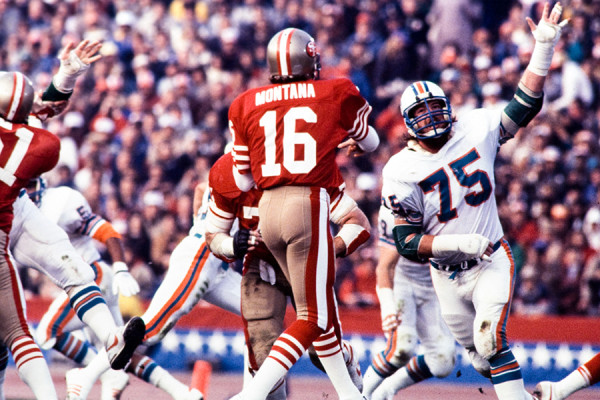 Miami Dolphins defensive end Doug Betters (75) chases San Francisco quarterback Joe Montana during an NFL game. Dave Cross photo | Courtesy photo