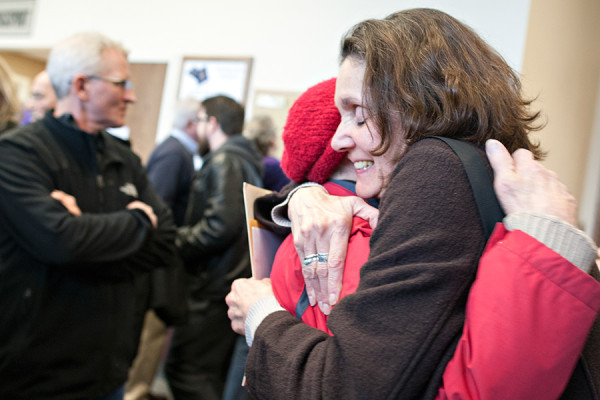 A supporter congratulates Susan Cahill, owner of All Families Healthcare, after Zachary Klundt, 24, of Columbia Falls, appeared in Flathead County District Court last year. Klundt allegedly broke into All Families Healthcare on March 4. Beacon File Photo
