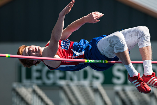 Josh Sandry competes in the high jump during the 40th annual Archie Roe track and field meet at Legends Stadium in Kalispell on May 2, 2015. Greg Lindstrom | Flathead Beacon