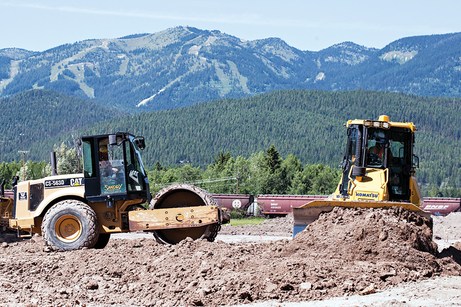 Crews move dirt at High Point on East Second Street in Whitefish. Greg Lindstrom | Flathead Beacon