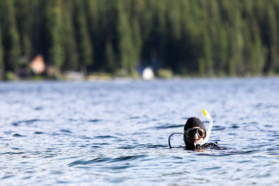 Cal Colbert goes scuba diving on McGregor Lake on June 17. Justin Franz | Flathead Beacon