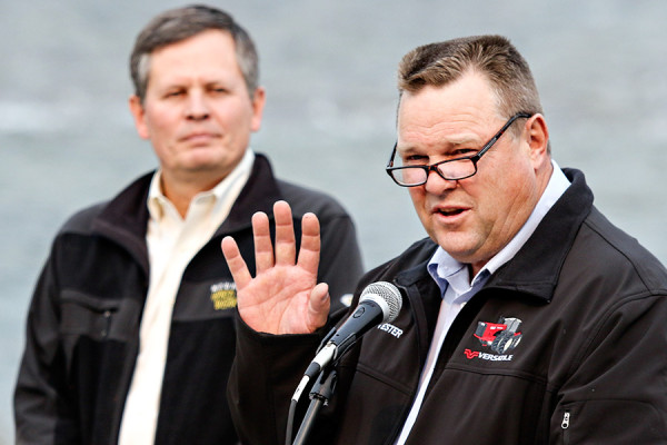 U.S. Sens. Jon Tester, right, and Steve Daines speak about the North Fork Watershed Protection Act alongside Michael Jamison, with the National Parks Conservation Association, on Aug. 24, 2015. Greg Lindstrom | Flathead Beacon
