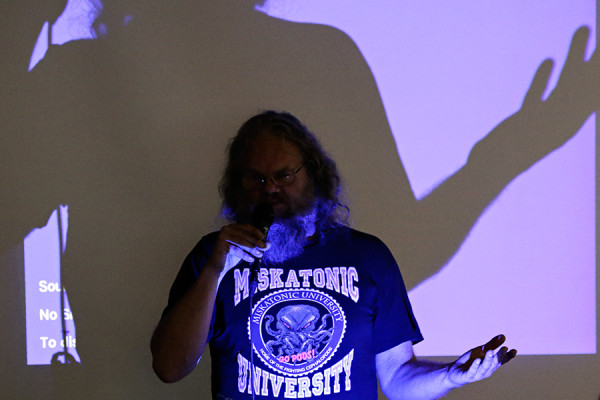 A large shadow is cast as Brian Sullivan, of the Montana Bigfoot Project, speaks at the Big Sky Bigfoot Conference in Hot Springs on Oct. 24, 2015. Greg Lindstrom | Flathead Beacon