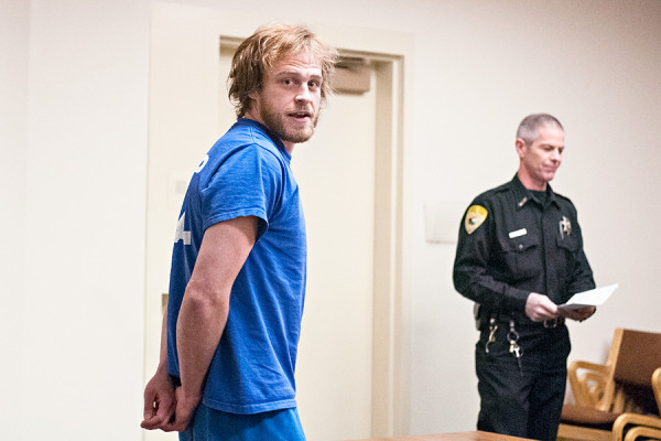 David Joseph Lenio shouts at media as he makes his initial appearance at Flathead County Justice Court on Feb. 19, 2015. Greg Lindstrom | Flathead Beacon