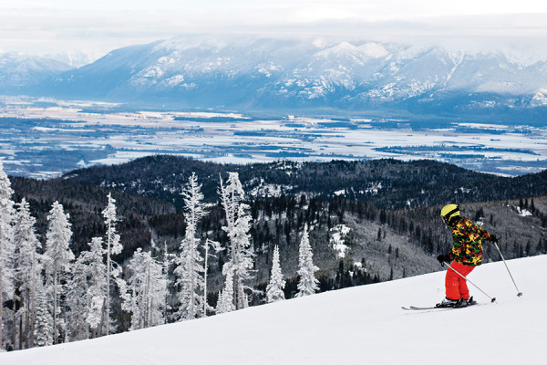 A skier enjoys fresh powder on opening day at Blacktail Mountain Ski Area. Beacon File Photo