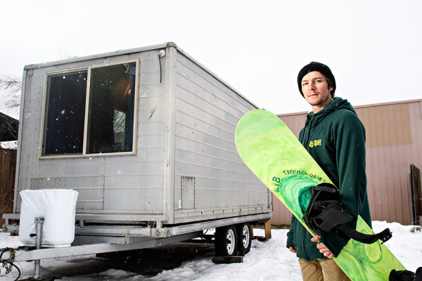 Pro snowboarder Jason Robinson, pictured in front of his small house built on a trailer on Jan. 21, 2016. Greg Lindstrom | Flathead Beacon