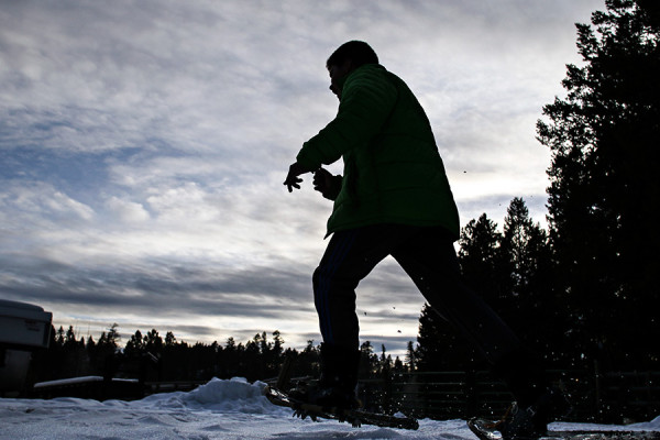 Dusty Deist runs in his snowshoes. Greg Lindstrom | Flathead Beacon