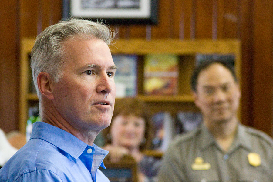 Mark Preiss, left, CEO of the Glacier National Park Conservancy, speaks during a brief ceromony to welcome Glacier’s new superintendent, Jeff Mow. Justin Franz | Flathead Beacon