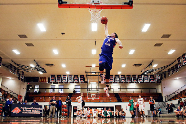 Bigfork's Kyler Burns competes in the dunk contest at the Les Schwab Shootout at Flathead High School on March 24, 2016. Greg Lindstrom | Flathead Beacon
