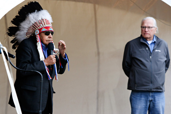 Chief Earl Old Person, left, speaks during a ceremony before a group of 88 bison from Alberta’s Elk Island National Park are delivered to the Blackfeet Indian Reservation on April 4, 2016. Greg Lindstrom | Flathead Beacon