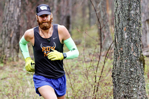 Matthew Smeltzer runs along the Whitefish Trails on April 14, 2016. Greg Lindstrom | Flathead Beacon