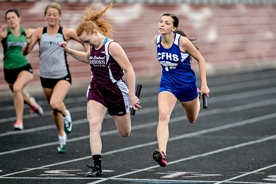 Columbia Falls' Mary Baker stretches at the finish line during the 4x100 meter relay race during the Class A and B track and field championships on May 28, 2016 at Van Winkle Stadium in Bozeman. Courtesy Adrian Sanchez-Gonzalez | Bozeman Daily Chronicle
