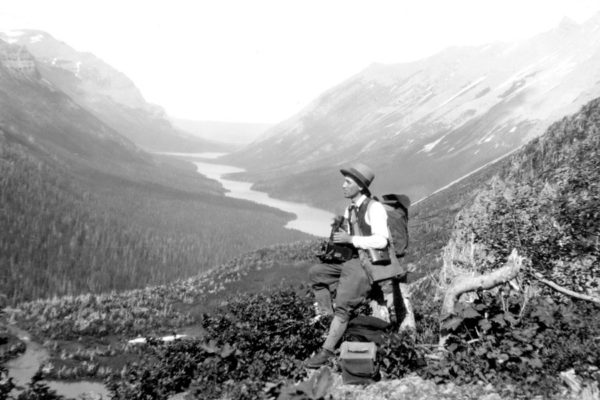 11914---George-Abeel-of-NYC,-resting,-camera-in-hand,-on-the-subalpine-terrain-below-Stony-Indian-Pass-(no-year)