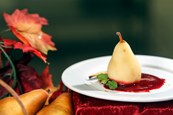 Pears poached in tequila with prickly pear-raspberry sauce. Thanksgiving side dishes on Nov. 14, 2016. Greg Lindstrom | Flathead Beacon