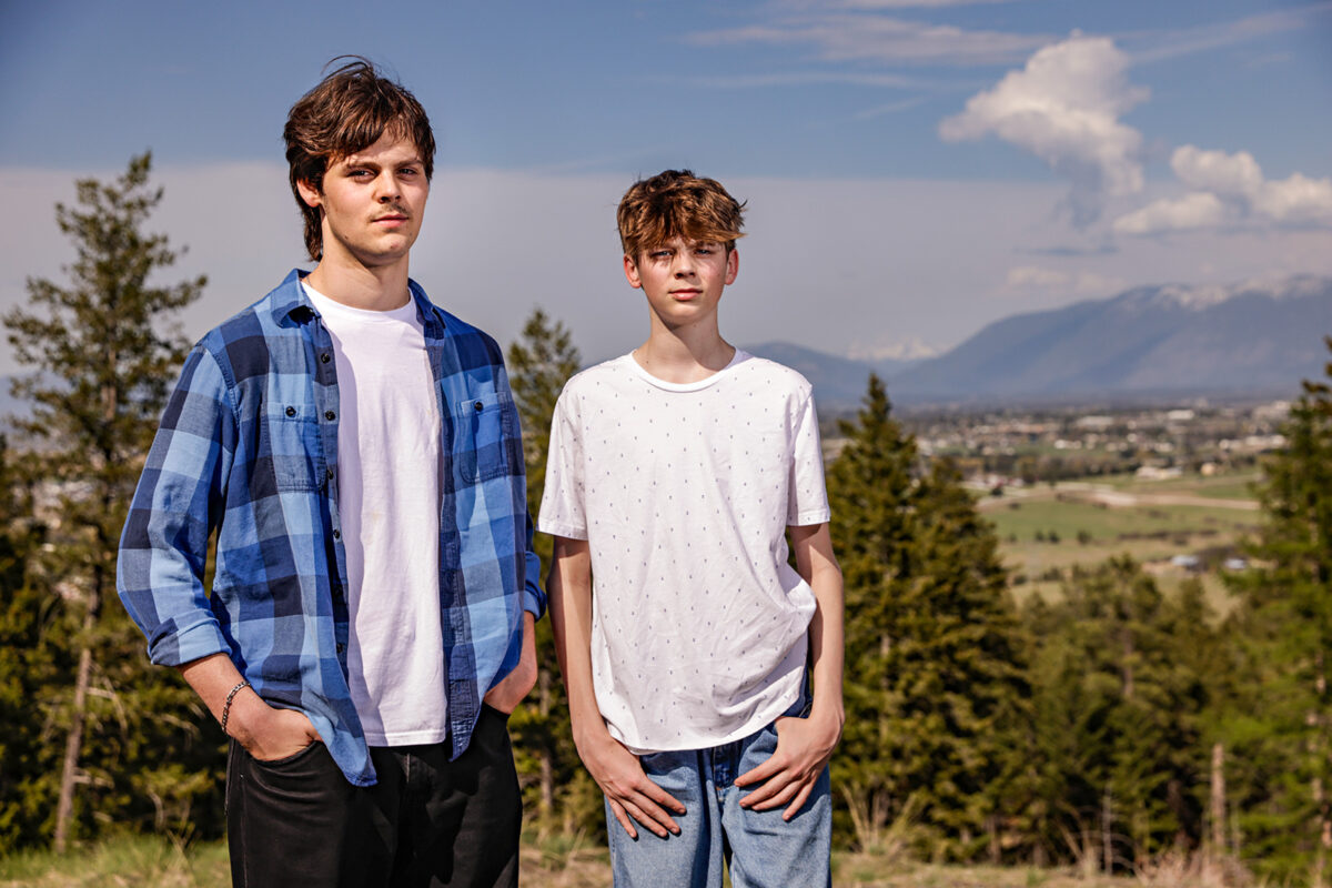 Lander and Badge Busse on a hill near their home overlooking Kalispell. The Busse brother are plaintiffs in Montana's landmark climate case.