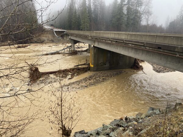 Flooding washes way the Farm to Market Bridge near Libby. Hunter D'Antuono | Flathead Beacon