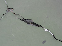 deep crack in Columbia Falls tennis court